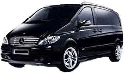 Luxury black Mercedes-Benz van with a sleek design, premium comfort, and spacious interior for executive and group transport.